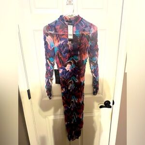 Bebe multicolored form fitting dress size extra small with slip underneath